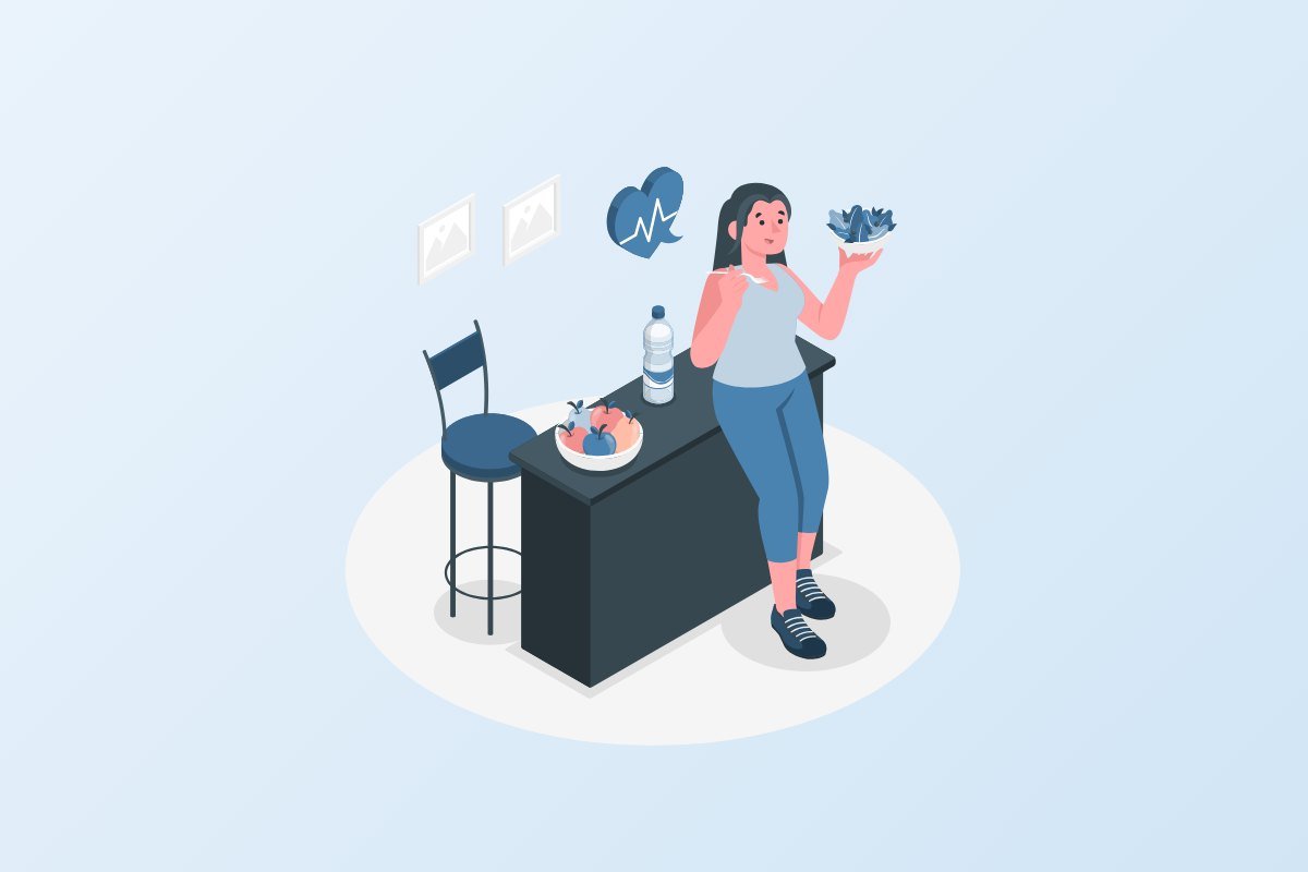 Woman eating a fresh, healthy meal at a table